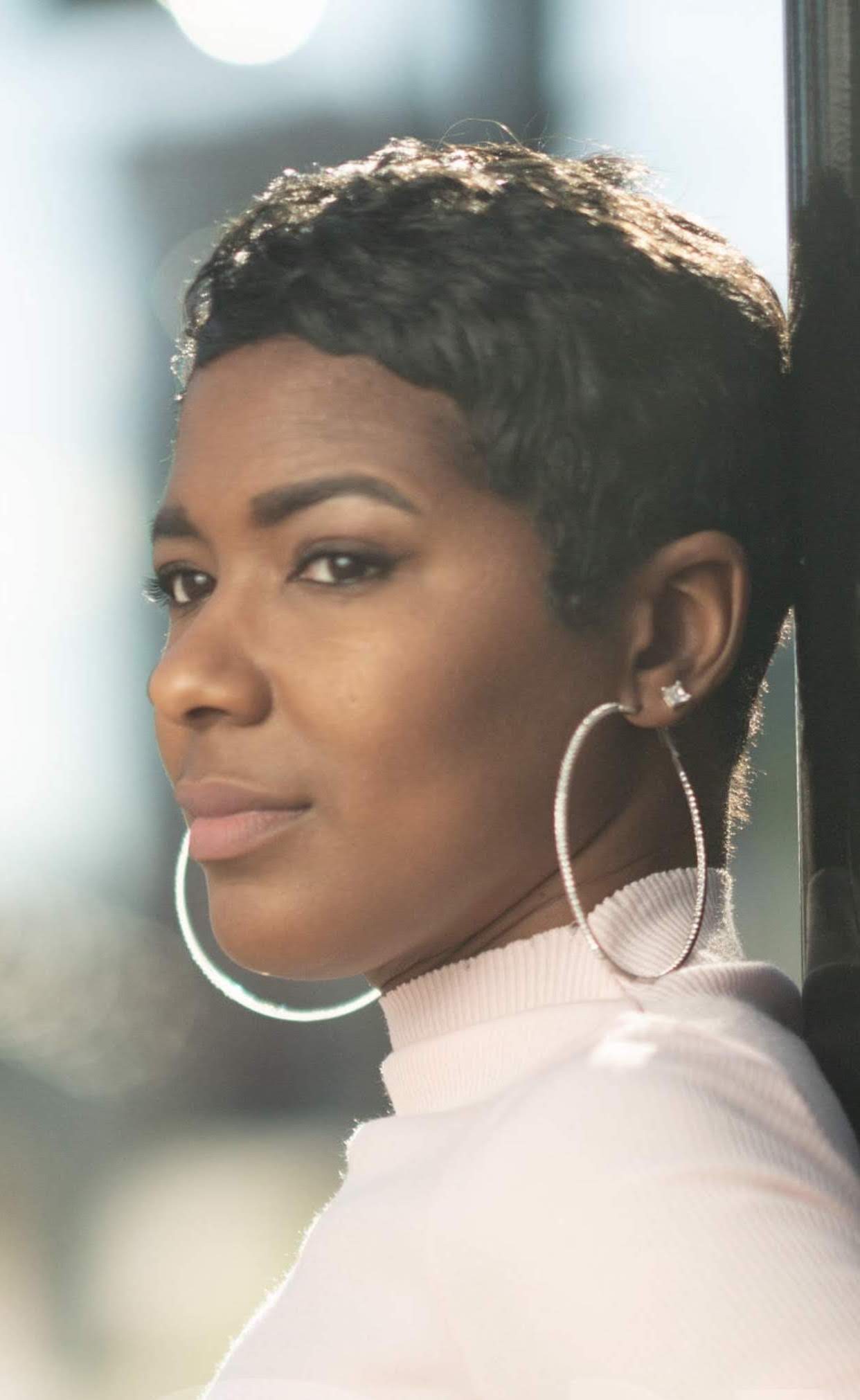 Tia Gentry, Brand Strategist with pixie short haircut